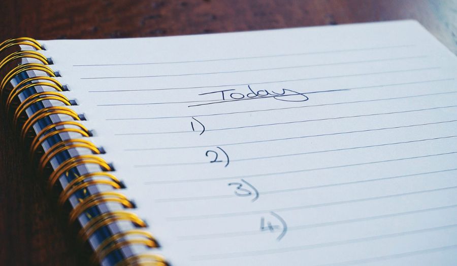 A picture of a numbered to-do list in a notebook.
