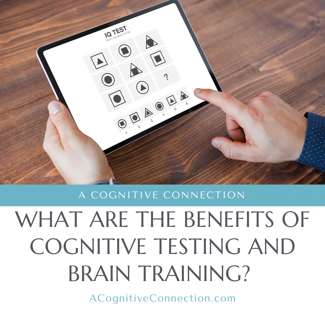 Hands holding a tablet or iPad that shows a brain training game in black and white.